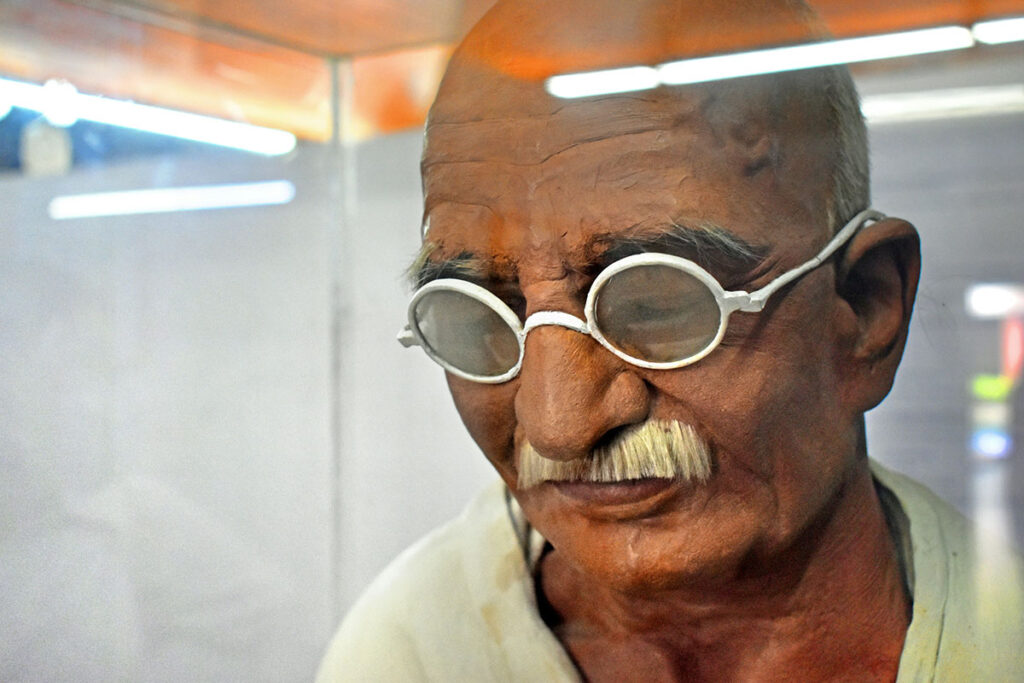 What is Satyagraha? What are the similarities within Buddhism?